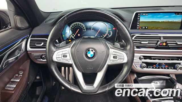 BMW 7 Series (G11) 740d xDrive M Sport 2017 — фото 13
