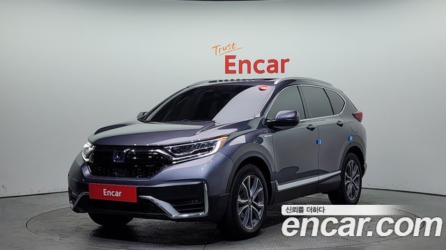 Honda CR-V (V) 2.0 Hybrid Touring 4WD 2022 — фото 1