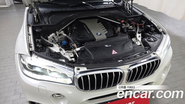 BMW X6 (F16) M50d 2015 — фото 6