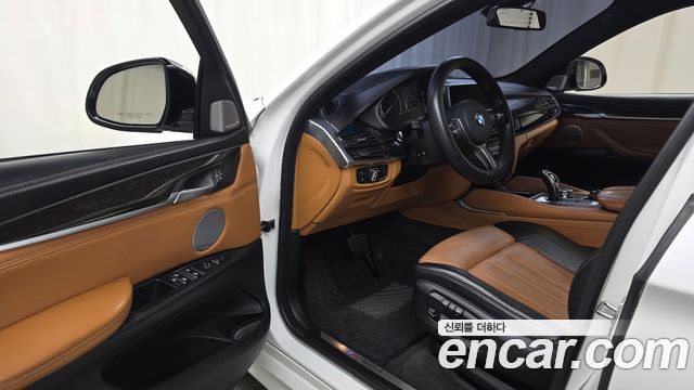 BMW X6 (F16) M50d 2015 — фото 10