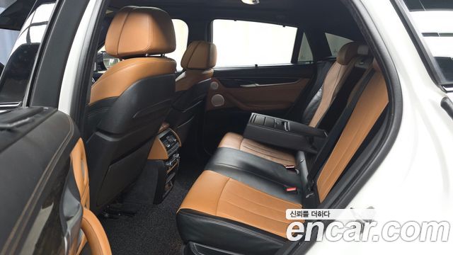 BMW X6 (F16) M50d 2015 — фото 11