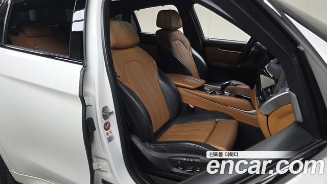 BMW X6 (F16) M50d 2015 — фото 12