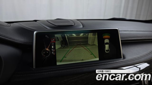 BMW X6 (F16) M50d 2015 — фото 16