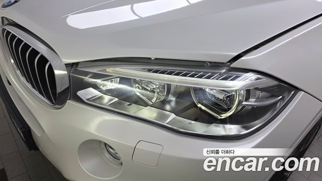 BMW X6 (F16) M50d 2015 — фото 22