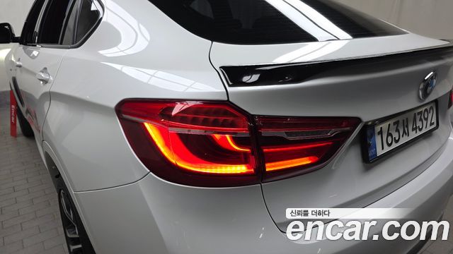 BMW X6 (F16) M50d 2015 — фото 23