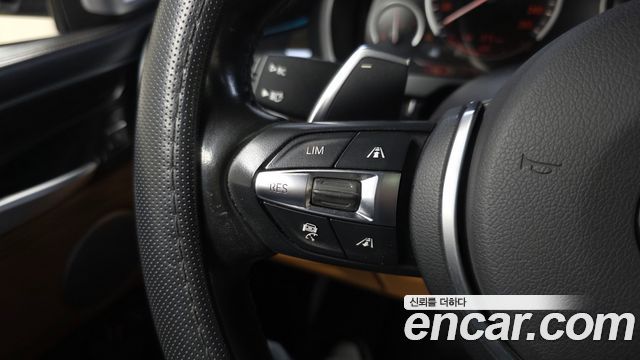BMW X6 (F16) M50d 2015 — фото 31