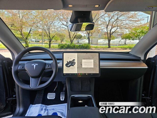 Tesla Model Y RWD 2025 — фото 10