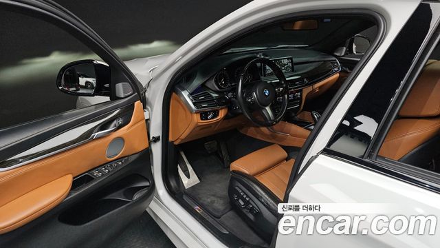 BMW X6 (F16) M50d 2017 — фото 11