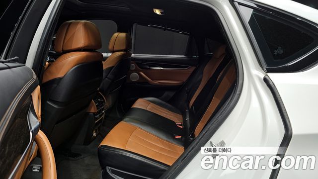 BMW X6 (F16) M50d 2017 — фото 12