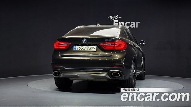 BMW X6 (F16) xDrive 40d 2015 — фото 4