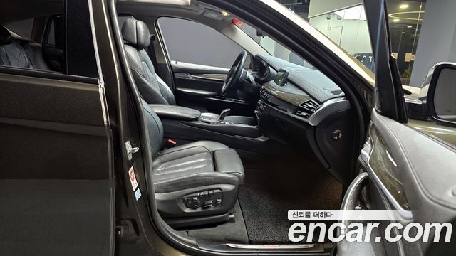 BMW X6 (F16) xDrive 40d 2015 — фото 11