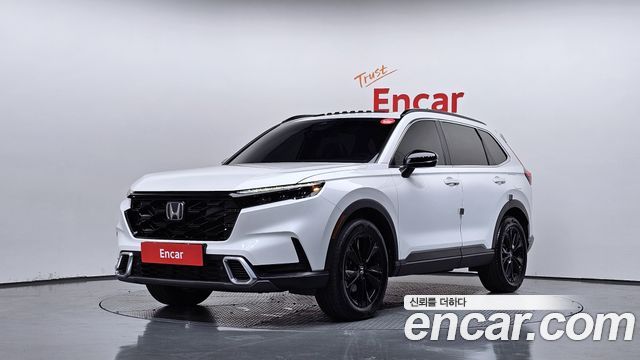 Honda CR-V (V) 2.0 Hybrid Touring 4WD 2024 — фото 1