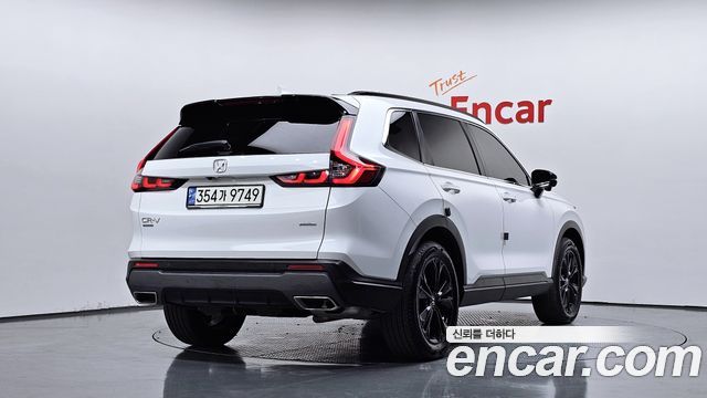 Honda CR-V (V) 2.0 Hybrid Touring 4WD 2024 — фото 2