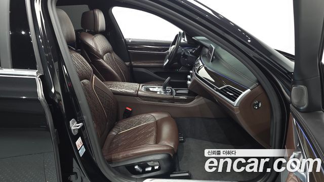BMW 7 Series (G11) 740Li xDrive Design Pure Excellence 2020 — фото 12