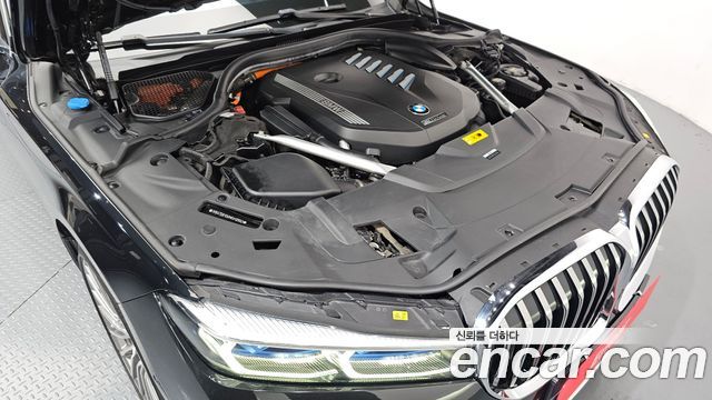 BMW 7 Series (G11) 745e iPerformance Design Pure Excellence 2021 — фото 6