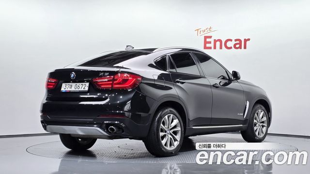 BMW X6 (F16) xDrive 30d 2015 — фото 2