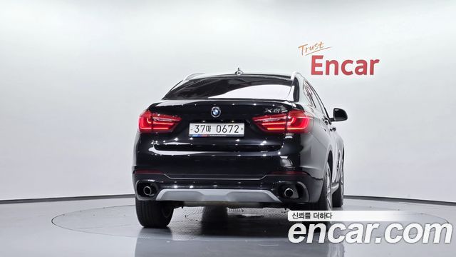 BMW X6 (F16) xDrive 30d 2015 — фото 4