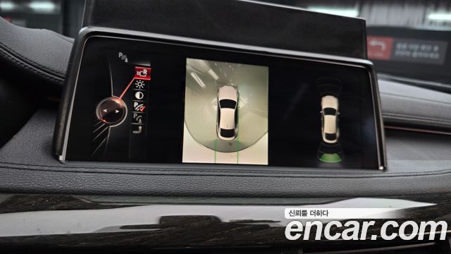 BMW X6 (F16) xDrive 30d 2015 — фото 17
