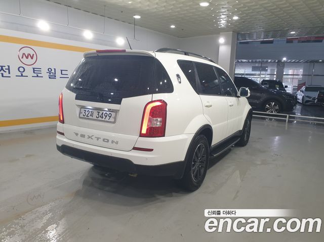 KG Mobility (SsangYong) Rexton W 2.0 4WD RX7 Luxury 2013 — фото 4