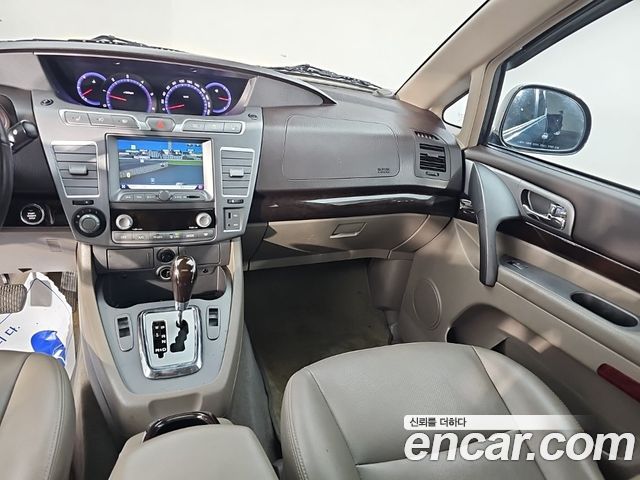 KG Mobility (SsangYong) Korando Turismo 4WD GT 9-seater 2014 — фото 8