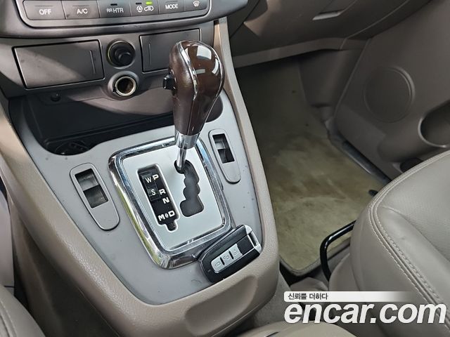 KG Mobility (SsangYong) Korando Turismo 4WD GT 9-seater 2014 — фото 10