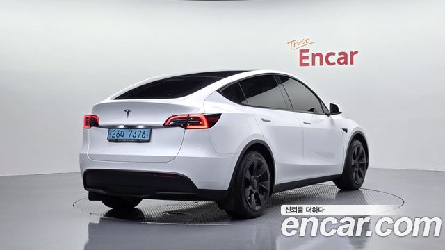 Tesla Model Y RWD 2023 — фото 2