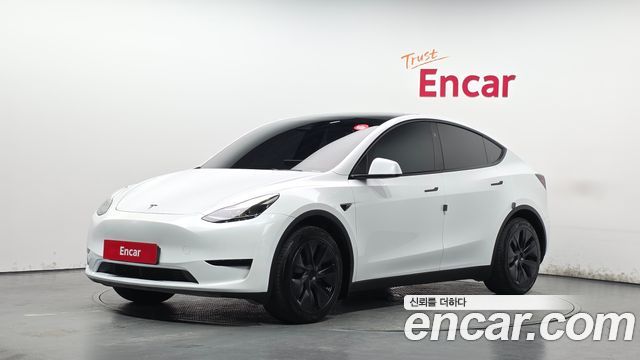 Tesla Model Y RWD 2024 — фото 1