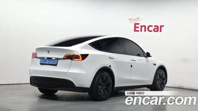 Tesla Model Y RWD 2024 — фото 2