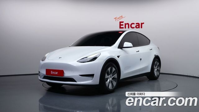 Tesla Model Y RWD 2024 — фото 1