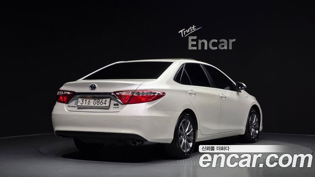 Toyota Camry Hybrid XLE 2016 — фото 2