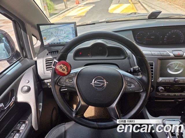 KG Mobility (SsangYong) Korando Turismo 2WD TX 9-seater 2017 — фото 16