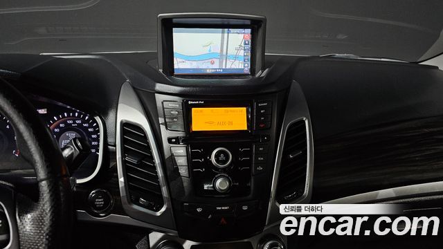 KG Mobility (SsangYong) Korando C 2.0 CVT 2WD Deluxe 2014 — фото 15