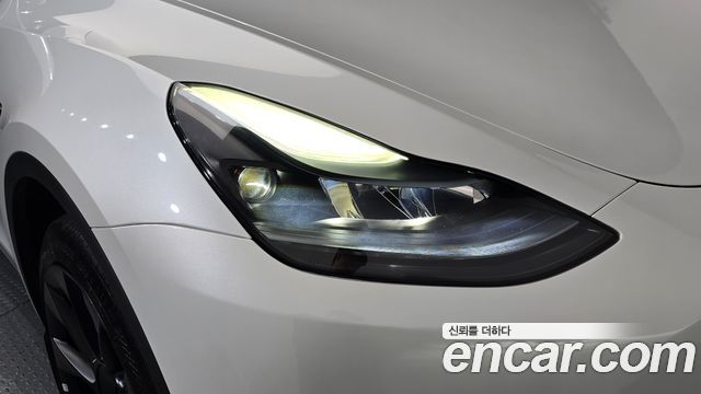 Tesla Model Y Long Range AWD 2024 — фото 28