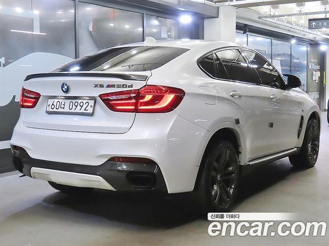 BMW X6 (F16) M50d 2015 — фото 4