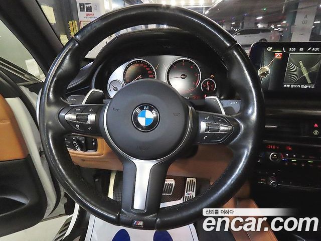 BMW X6 (F16) M50d 2015 — фото 8