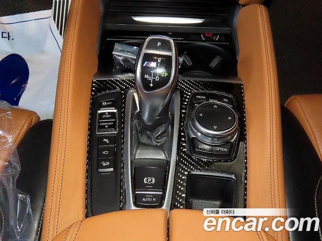 BMW X6 (F16) M50d 2015 — фото 16