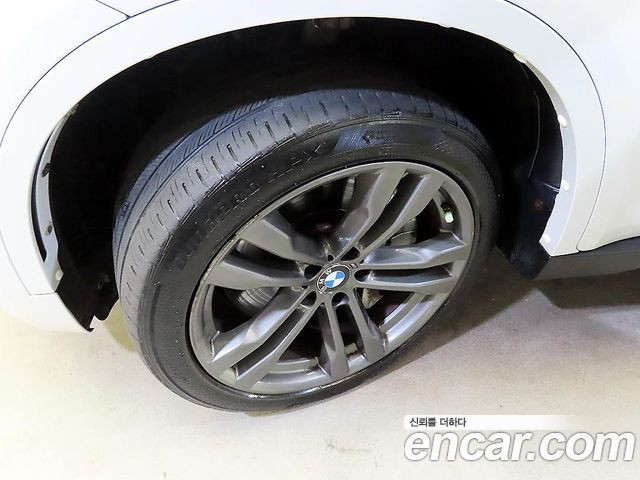BMW X6 (F16) M50d 2015 — фото 24