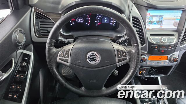 KG Mobility (SsangYong) Korando C 2.0 CVT 4WD Deluxe 2014 — фото 13