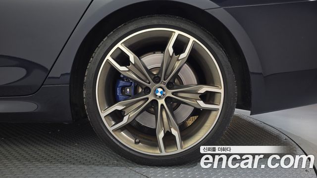 BMW 5 Series (G30) M550i xDrive 2022 — фото 21