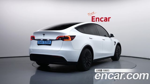 Tesla Model Y RWD 2024 — фото 2