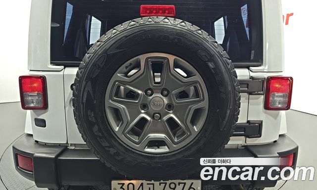 Jeep Wrangler (JK) 3.6 Sahara 4Door 2016 — фото 29