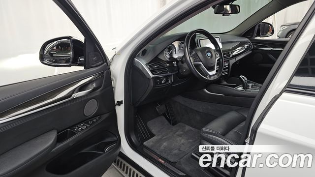 BMW X6 (F16) xDrive 40d 2015 — фото 10