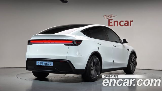 Tesla Model Y RWD 2025 — фото 2