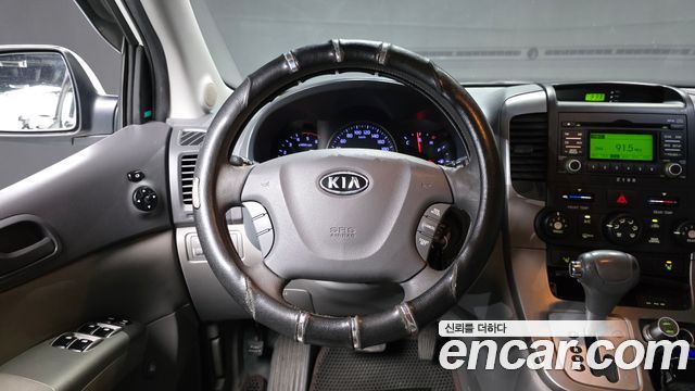 Kia Carnival R Grand Carnival GLX Deluxe 2012 — фото 13