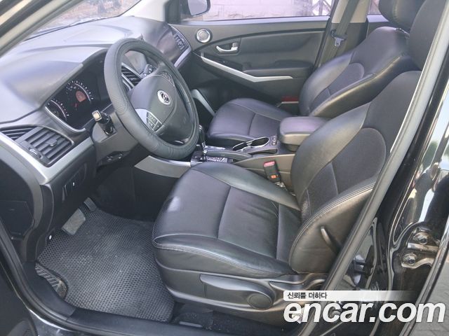 KG Mobility (SsangYong) Korando C 2.0 CVT 2WD Deluxe 2014 — фото 15