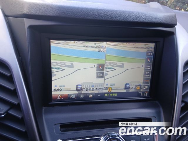 KG Mobility (SsangYong) Korando C 2.0 CVT 2WD Deluxe 2014 — фото 19