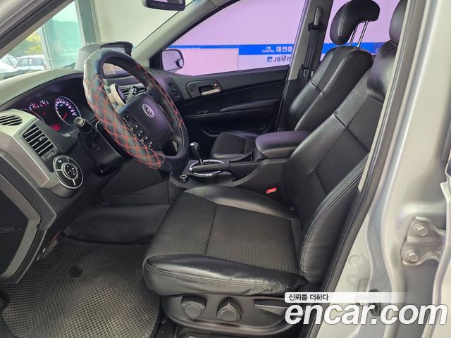 KG Mobility (SsangYong) Korando Sport CX5 2WD PASSION 2012 — фото 10