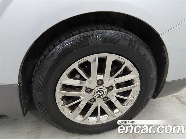KG Mobility (SsangYong) Korando Turismo 4WD Chateau 11-seater High-roof 2015 — фото 24