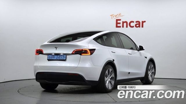 Tesla Model Y RWD 2024 — фото 2