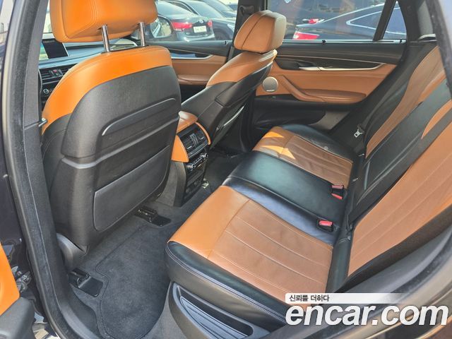 BMW X6 (F16) M50d 2016 — фото 15